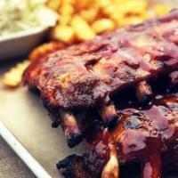 Baby Back Ribs · our house-rubbed, fall-off-the-bone back ribs, braised in duke pale ale for hours and char-g...
