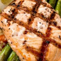 Grilled Salmon · charbroiled atlantic salmon, served with rice pilaf & asparagus.