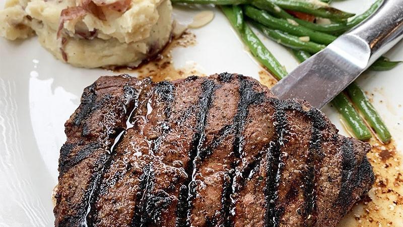 Top Sirloin · 10 oz. USDA Choice top sirloin served with redskin mashed potatoes and green beans almondine.