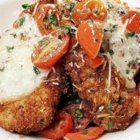 Chicken Tuscano · Lightly breaded, pan fried chicken breast topped with melted provolone cheese, and served ov...