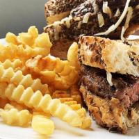 Patty Melt · Half-pound GC signature beef blend, stacked with caramelized onions and melted white cheddar...