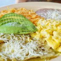 Chilaquiles Con Huevos · Delicious deep-fried tortilla chips soaked in our hot or mild sauce. Also served with eggs, ...