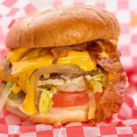 Bacon Bros. Burger · 1/4 lb. burger, cheese, onions, pickle, lettuce, tomato, bacon, barbecue, and house sauce.