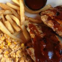 Mouth Watering Ribs · Gluten free. Tender baby back dry-rubbed ribs, slow roasted and then smothered in our signat...