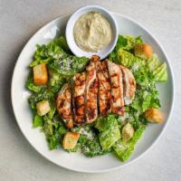 Chicken Caesar Salad · Chargrilled chicken breast, Reggiano parmesan, homemade croutons and Caesar dressing. All Ca...