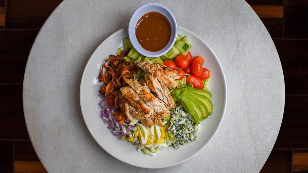 Chicken Cobb · Chargrilled chicken breast, cucumber, tomato, red onion, egg, blue cheese, bacon and avocado. Choice of dressing. All Carson’s salad dressings are homemade from legendary 70 year old family recipes.