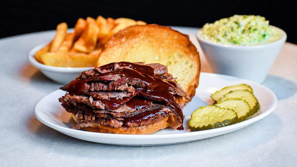 Bbq Beef Sandwich · 24 Hr Slow Smoked overnight Barbecue Beef Brisket served daily until we run out. Sandwich includes award winning Cole Slaw and choice of potato or fresh green vegetable.