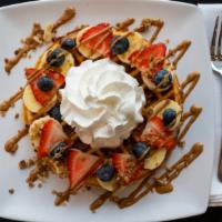 Naughty Waffle · Bananas, almond butter, strawberries, blueberries,house-made granola, whipped cream.