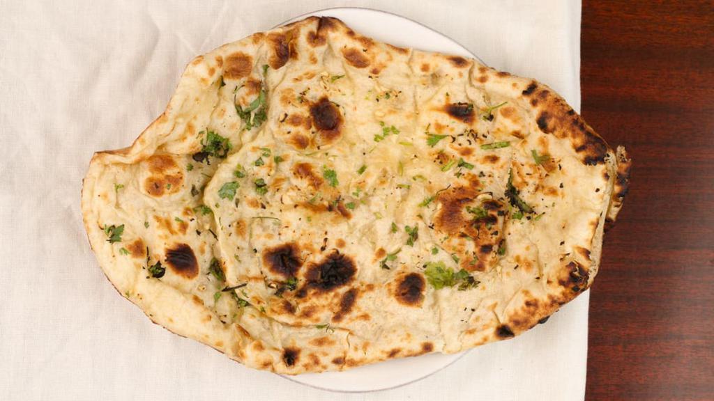 Garlic Naan. · Soft flour bread stuffed with fresh garlic.