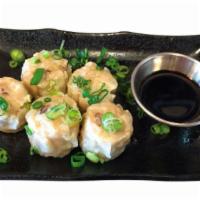 Pork Shumai · Five pieces of steam pork dumplings with special sauce.
