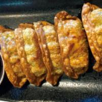 Fried Vegetarian Gyoza (5 Pieces) · Veggie mix.