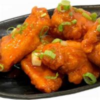 Ghost Pepper Thai Chili Wings · Homemade Ghost Pepper Thai Chili sauce, 5 pcs chicken wings, green onions.