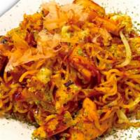 Yakisoba · Cabbage, carrots, bean sprouts, sweet onions, seaweed powder, fish flakes, red ginger.