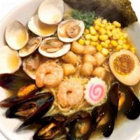 Seafood Shio Ramen · Japanese salt flavor broth, shrimps, scallops, clams, mussels, naruto, corn, egg, green onio...