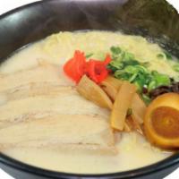 Tonkotsu Ramen · Pork base, chashu, bamboo shoots, egg, green onion, black mushroom, red ginger, nori.