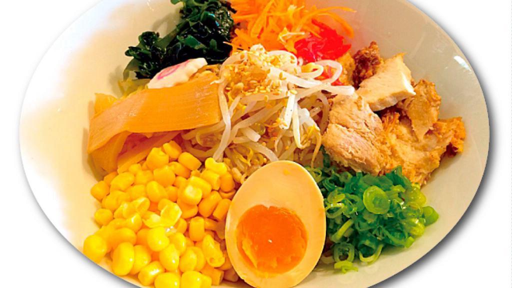 Japanese Style Cold Noodle-Hiyashi Chuka · This Japanese fish consists of chilled ramen noodles topped with carrots, bean sprouts, green onions, half of a seasoned soft boiled egg, wakame seaweed, bamboo shoots, corn and red ginger.