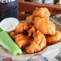 10 Boneless Wings (Same Sauce) · 10 Boneless Wings, hand-breaded and cooked to perfection, then tossed in your favorite Roost...