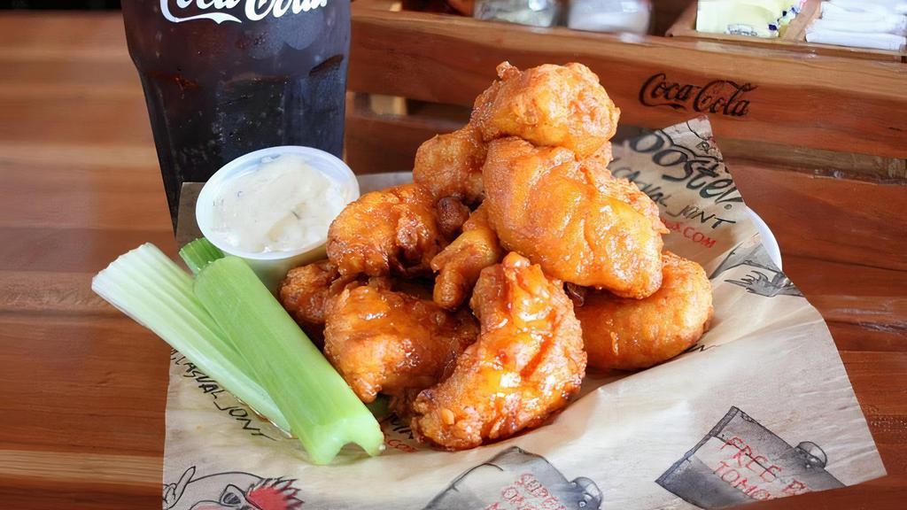 10 Boneless Wings (Same Sauce) · 10 Boneless Wings, hand-breaded and cooked to perfection, then tossed in your favorite Roosters original sauce.