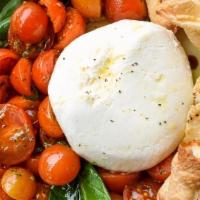 Burrata Caprese · local cherry tomatoes, aged balsamic, extra virgin olive oil, garlic flatbread