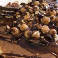 Turtle · Pancakes filled with chocolate chips, caramel chips and pecans.