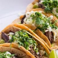 Tacos Jalisco Dinner (4 Pcs) · Delicious charbroiled skirt steak tacos topped with queso fresco, guacamole, cilantro, and o...