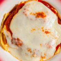 Ravioli · Meat or cheese filled in a meat or marinara sauce plain or baked with mozzarella