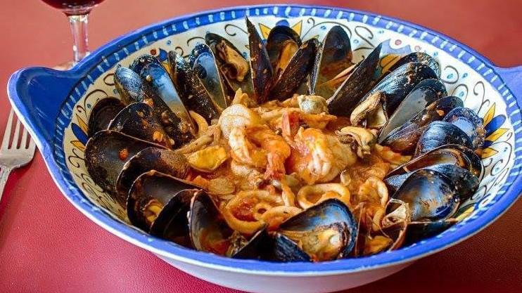 Pasta Pescatora Red · Sautéed Shrimp, Scallops, Mussels, Calamari and Clams in a light red sauce over linguine