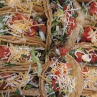 20 Tacos Supreme (Plus 2Liter Coke) · Letteuce,Tomato,Onions , Cilantro,Cheese and Sour Cream