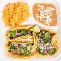 Taco Plate (Mexican Style) · 3 Tacos with meat Onions and Cilantro ONLY