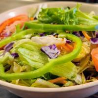 Garden Dinner Salad · Mix of fresh greens, carrots, red cabbage, green peppers, and tomatoes. Comes with a choice ...
