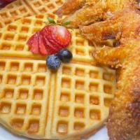 Chicken & Waffles With Homemade Maple Syrup · Chef crafted waffles with, deep -fried jumbo wings Sprinkled with special seasoning. Served ...