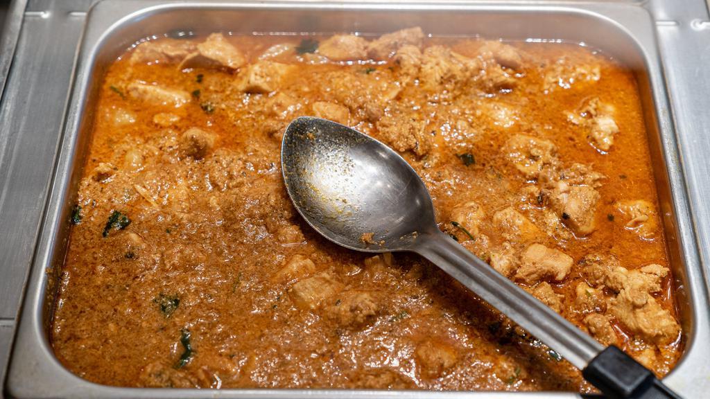 ) Chicken Curry · Spicy.  Mild to medium hot spiced chicken with gravy.