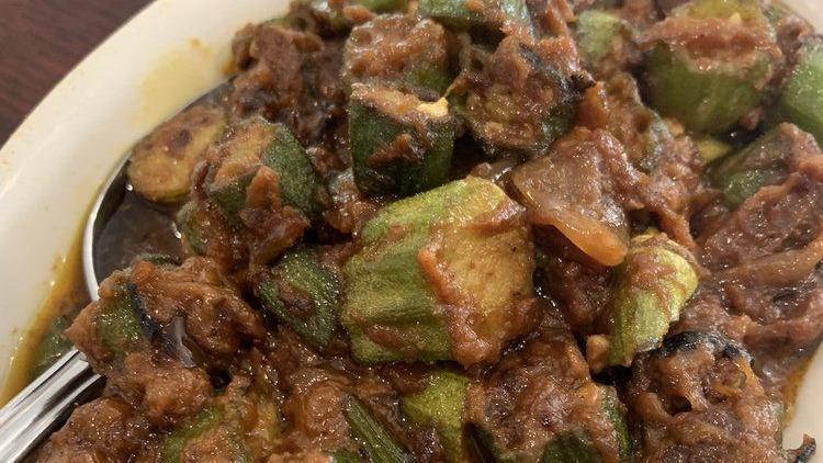) Goat Kashmiri Kurma · Goat off bone cooked in rich spices with almonds.