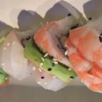 Rainbow Roll · Four different kinds of fish over the California roll with avocado.