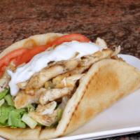 Chicken Pita · Fresh Grilled Chicken Chopped up on a pita, Served with Lettuce, Tomato, Gyro Sauce.  Add fr...