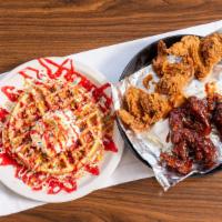Chicken & Waffles · four deep-fried whole wings or three mighty tenders, and one waffle. .