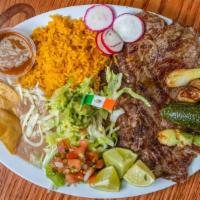 Carne Asada Plate · Served with rice, beans, tortillas and salad
