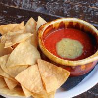 Chips & Salsa · Tortilla Chips , Salsa Rojo and Verde (Vegan, *Tortillas may be cooked in shared fryer)