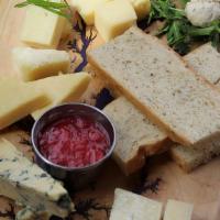 Cheese Board (6) · Includes our full selection of cheeses (Gruyere,  Tallegio, Parmigiano Reggiano, Manchego, P...