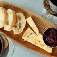 Cheese Board (1) · Accompanied by bread and a seasonal house made spread.