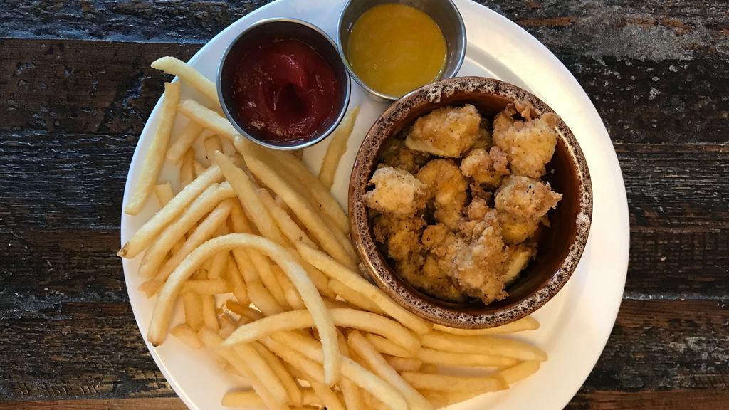 Kids Popcorn Chicken · Bite-sized breaded chicken pieces with fries or a side salad.