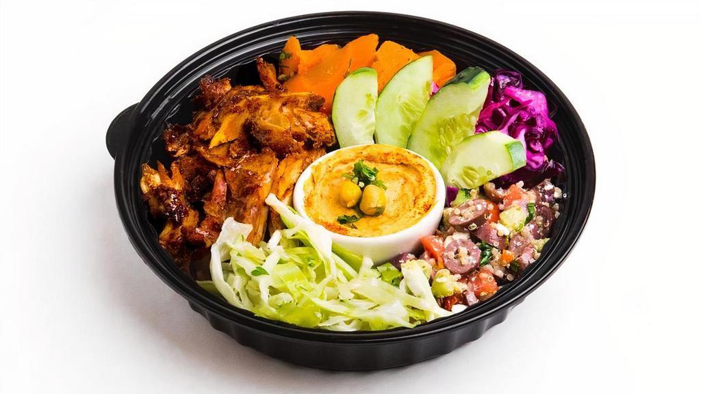 Shawarma Bowl · Fire-roasted marinated chicken thighs.