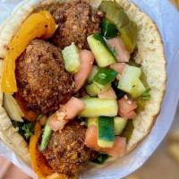 Dream Pita Boxed Lunch · Includes Falafel Pita, (hummus, Israeli salad, red cabbage, lettuce, and tahini) a Side of (...