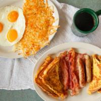 Paul Bunyan Combo · Three eggs, hash browns, four french toast halves, two strips of bacon, two sausage links an...