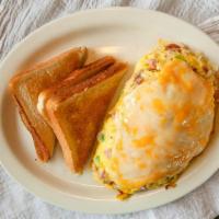 Rancher'S Omelette · Mixed with ham, onion, green peppers and bacon; stuffed with hash browns and smothered with ...