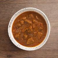 Lamb Curry · Lamb cooked with herbs and spices in a curry sauce.