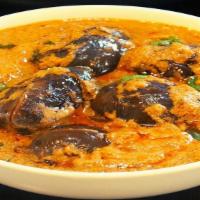 Bagara Baigan · Slit brinjals cooked in an aromatic homemade sauce.