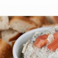 Spinach Dip · This fan favorite is back! Our cool, creamy spinach dip served with Green Mill homemade bread.