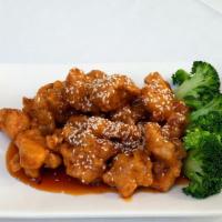 Sesame Chicken · Served with choice of rice and side.
