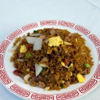 Pork Fried Rice · Served with egg bean sprouts and green onions.